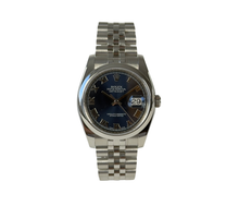 Rolex Datejust 116200 (2018) på jubilee-lænke og smooth krans med blå skive med romertal. Uret fremstår i rigtig flot stand, 9/19. Kommer som fuldt sæt:  boks, certifikat, manualer, kortholder og hangtag.