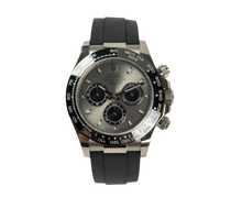 Rolex Daytona 116519LN "Ghost" (2017) på Oysterflex-rem. Uret er i god stand med alm. brugsspor. Kommer som fuldt sæt: Bokse, omslag, certifikat, manualer samt hangtag og whitetag. 