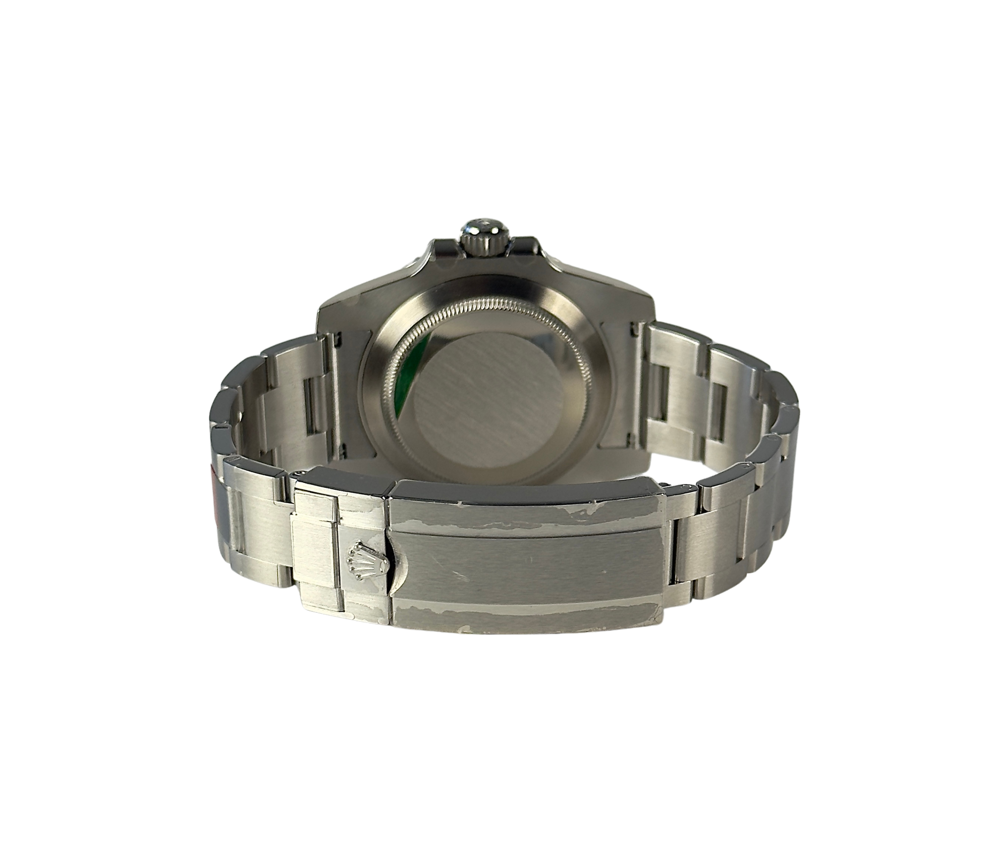 Rolex Submariner 116610LN (2017) i stål på oysterlænke. Uret fremstår i mint stand uden brugsspor, 10/10, stadig med fuld folie inkl. QR-kode. Kommer som fuldt sæt: Bokse, omslag, certifikat, manualer, hangtag og whitetag. 