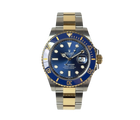 Rolex Submariner 126613LB fra 2021 i guld/stål med blå skive og lynette. Fremstår i rigtig god stand med alm. brugsspor. Kommer som fuldt sæt.