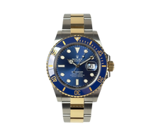 Rolex Submariner 126613LB fra 2021 i guld/stål med blå skive og lynette. Fremstår i rigtig god stand med alm. brugsspor. Kommer som fuldt sæt.