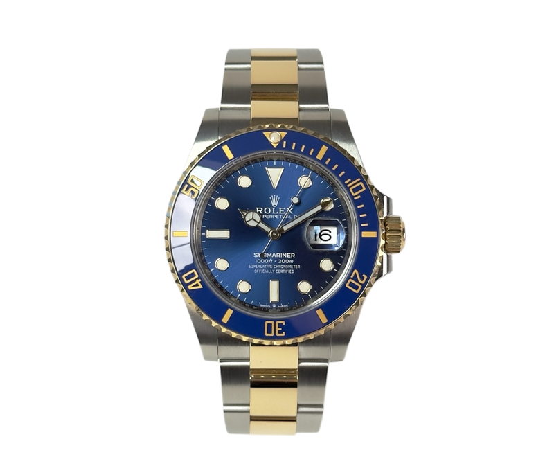 Rolex Submariner 126613LB fra 2021 i guld/stål med blå skive og lynette. Fremstår i rigtig god stand med alm. brugsspor. Kommer som fuldt sæt.