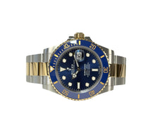 Rolex Submariner 126613LB fra 2021 i guld/stål med blå skive og lynette. Fremstår i rigtig god stand med alm. brugsspor. Kommer som fuldt sæt.