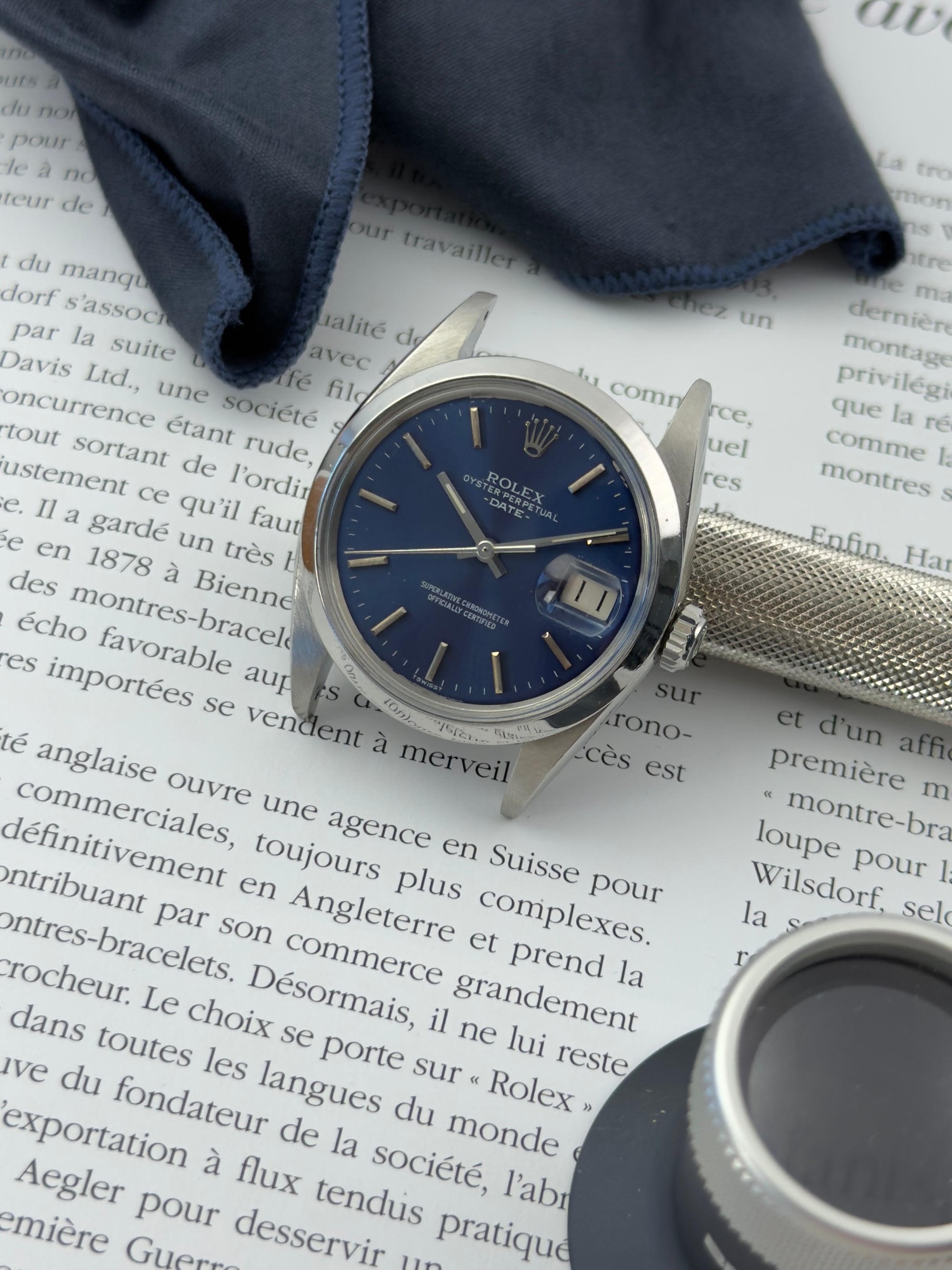 Rolex Date 1500 med blå skive og Oyster-lænke samt nyserviceret