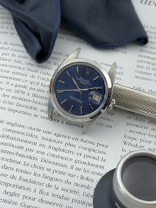 Rolex Date 1500 med blå skive og Oyster-lænke samt nyserviceret