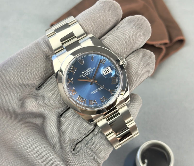 Rolex Datejust 126300 blue roman dial i rigtig god stand. Fuldt sæt.