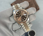 Rolex Datejust 126331 i rosaguld/stål på Jubilee-lænke og med riflet krans. Super stand. Fuldt sæt.