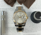 Rolex Datejust 126333 i guld og stål med sølvskive. I super god stand, komplet sæt.