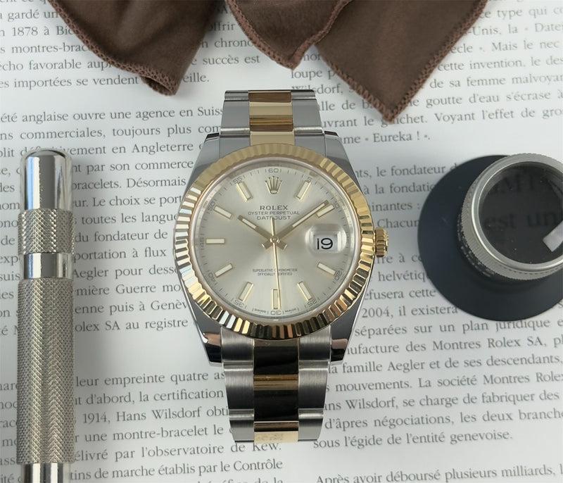 Rolex Datejust 126333 i guld og stål med sølvskive. I super god stand, komplet sæt.
