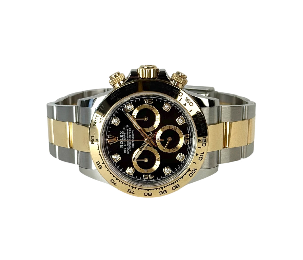Rolex Daytona 116503 i guld/stål med diamantindeks. Fuldt sæt.